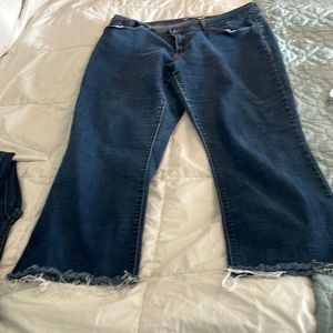 Levi jeans classic boot with fraying on the bottom size 33 waist